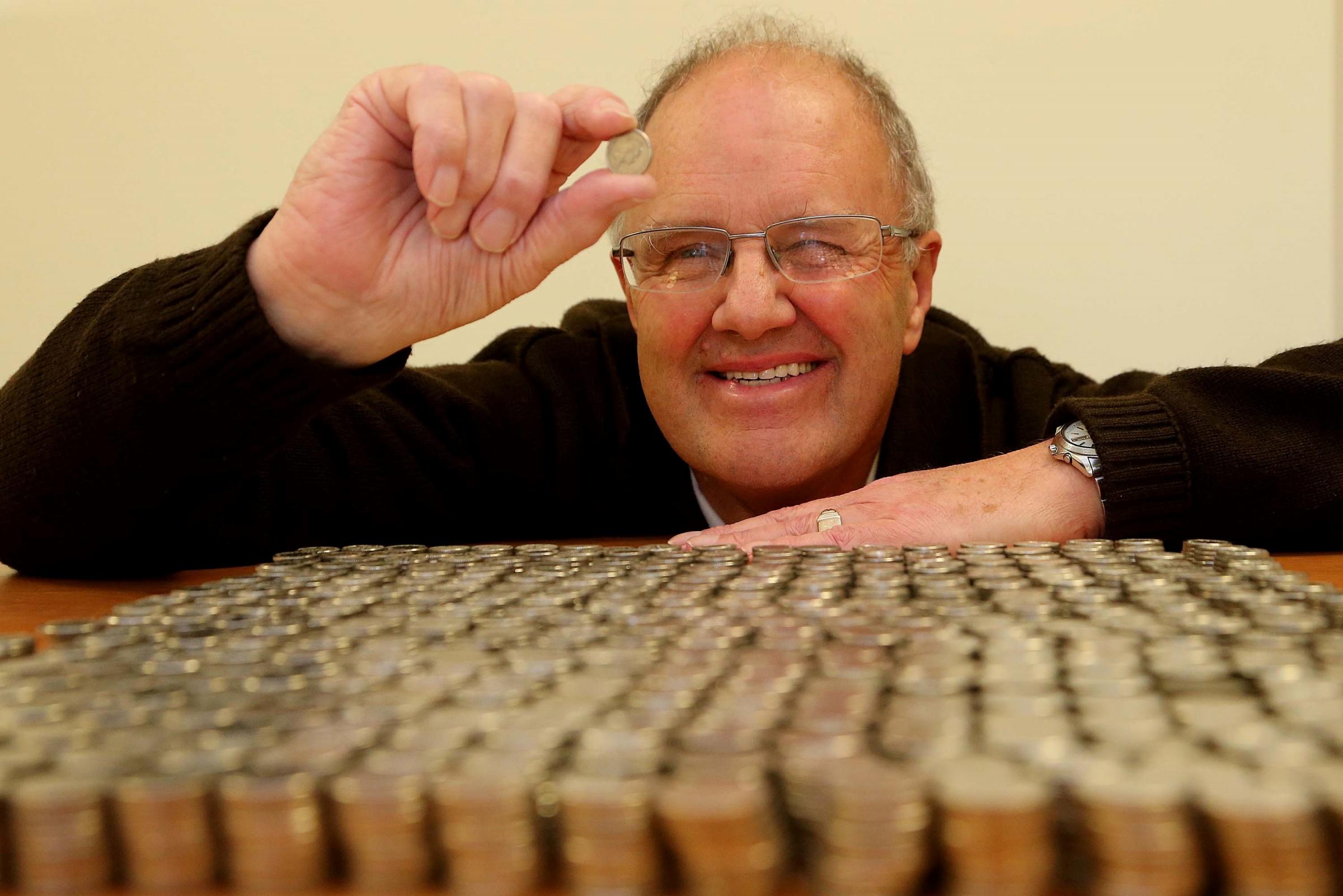 FUNDRAISER: Volunteer fundraiser Ian Watt (67) with just some of the half a million 5p pieces he has collected for the St Cuthberts Hospice in Durham. Picture DAVID WOOD.