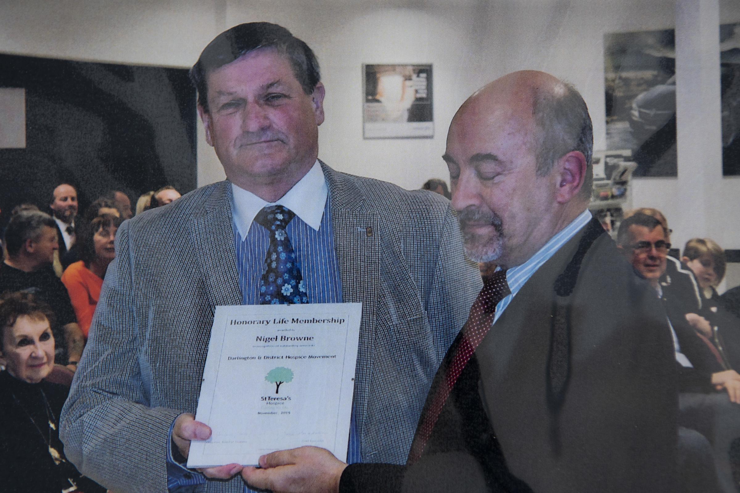 Dr Harry Byrne presents Nigel with his Honorary Life Membership at Sherwoods, in Darlington, in November 2015
