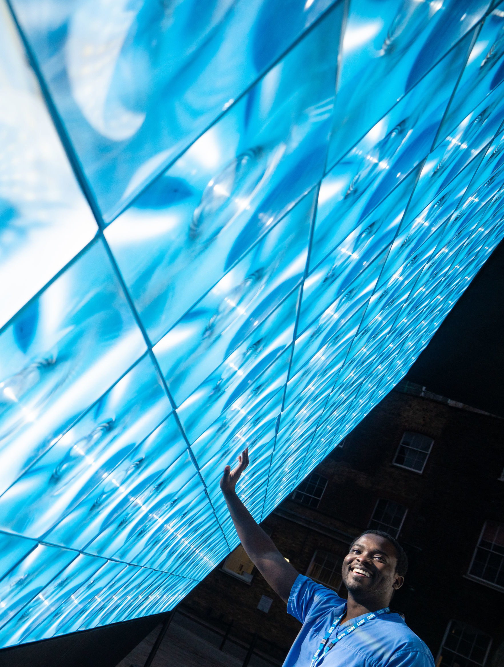 Trauma and Orthopaedic Surgeon Frank Acquaah looks at the Tunnel of Light at Guy’s and St Thomas’ Hospital in London Picture: DOMINIC LIPINSKI/PA