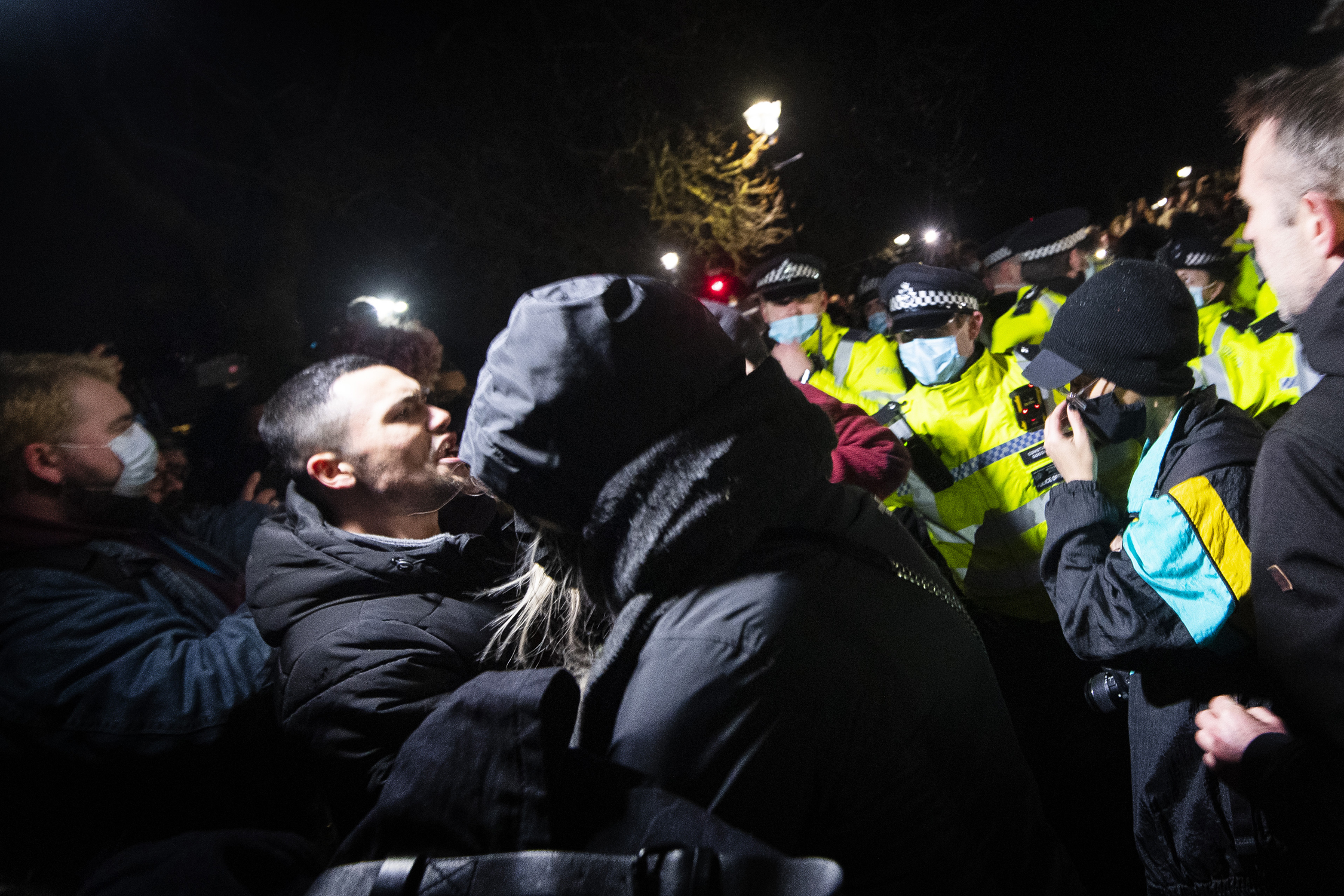 People clash with police as they gather in Clapham Common, London, after the Reclaim These Streets vigil for Sarah Everard was officially cancelled. Serving police constable Wayne Couzens, 48, has appeared in court charged with kidnapping and killing the