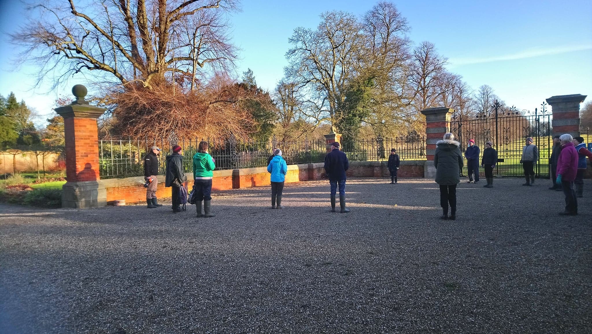 Garden volunteers have worked hard this year to maintain the large estate during lockdown, learning to work in new ways with social distancing and Covid secure procedures in place, pictured here at a morning briefing meeting