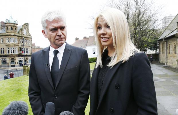 This Morning presenters Phillip Schofield and Holly Willoughby speak to the media at the time
