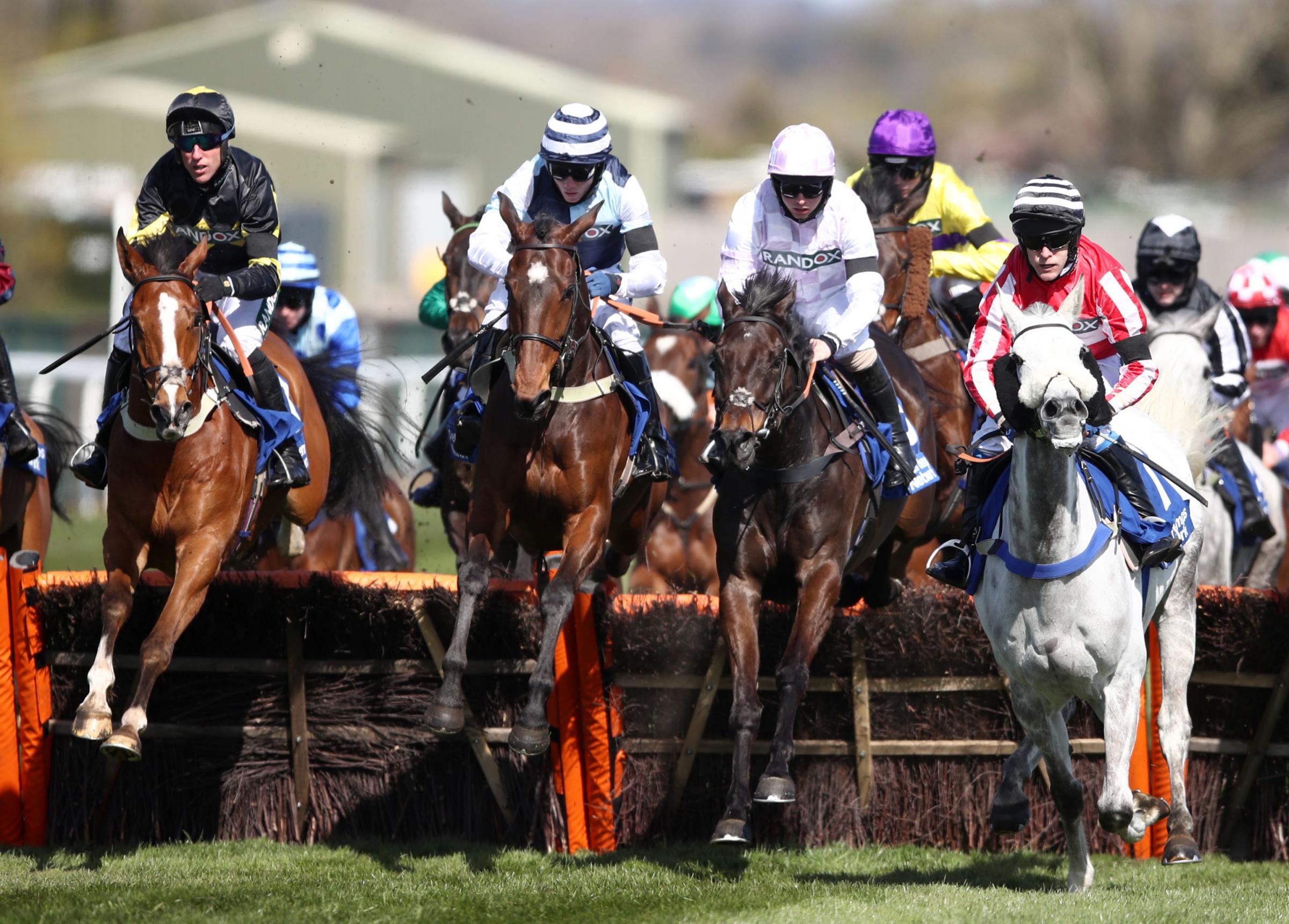 Runners and riders in the Pertemps Network Handicap Hurdle during Ladies Day of the 2021 Randox Health Grand National Festival at Aintree Racecourse, Liverpool. Picture date: Friday April 9, 2021. PA Photo. See PA story RACING Aintree. Photo credit