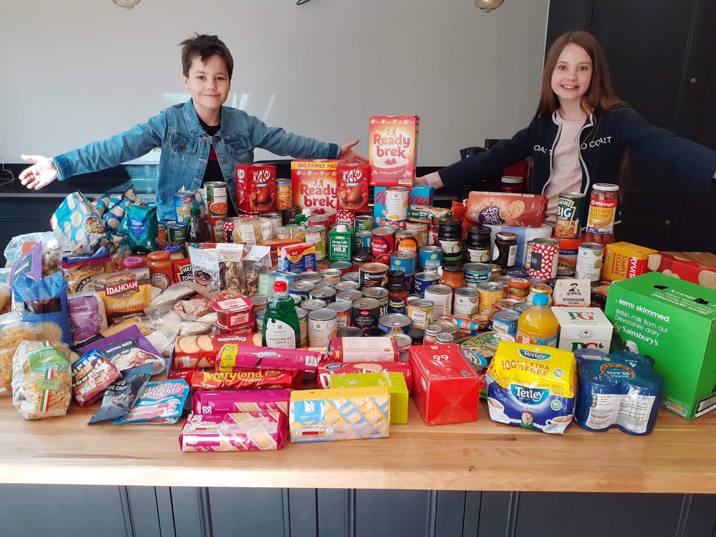 James and Florence with the food they collected 