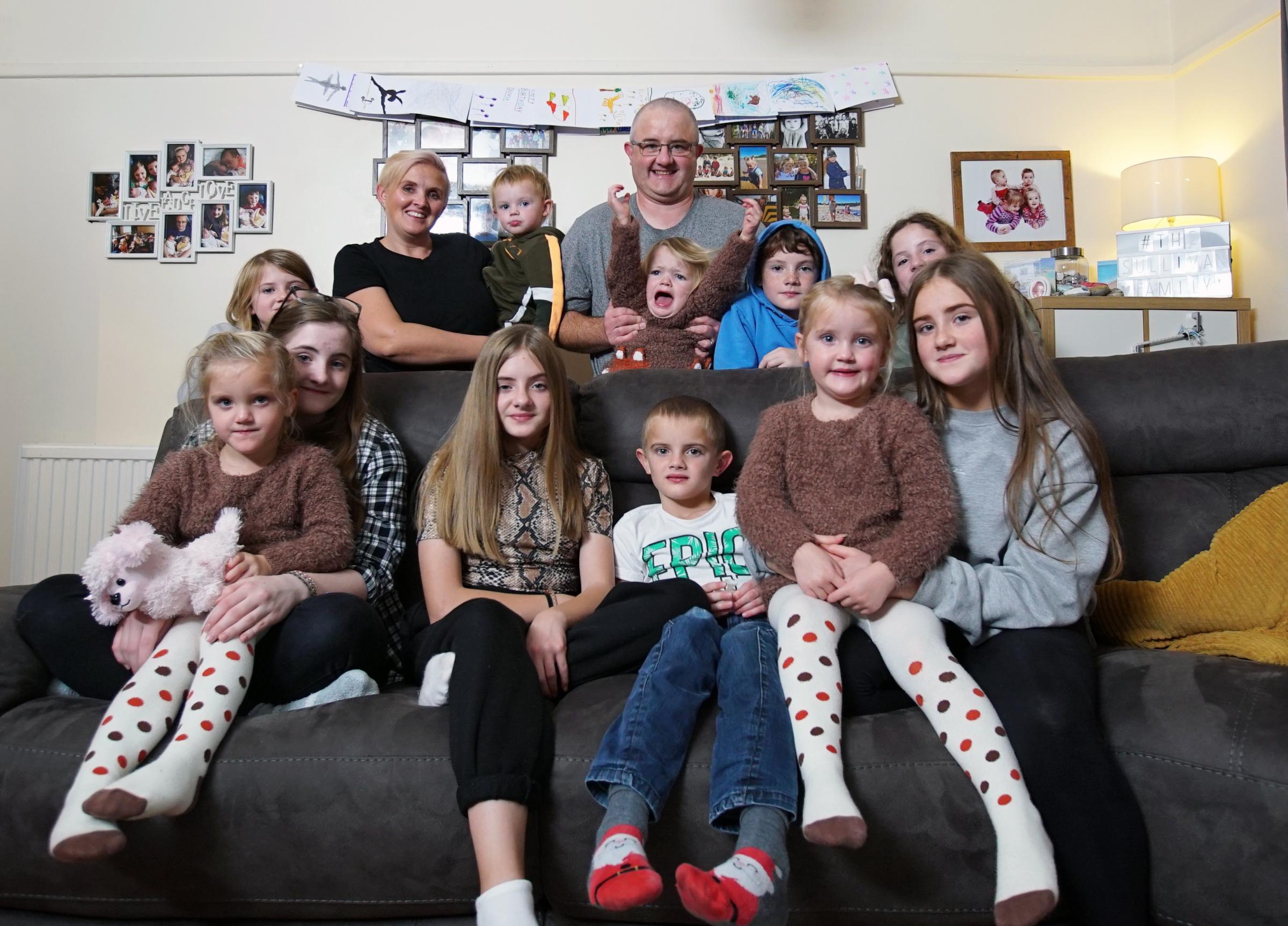 The Sullivan Family in Scotland: Mum Zoe and Dad Ben with their 11 children