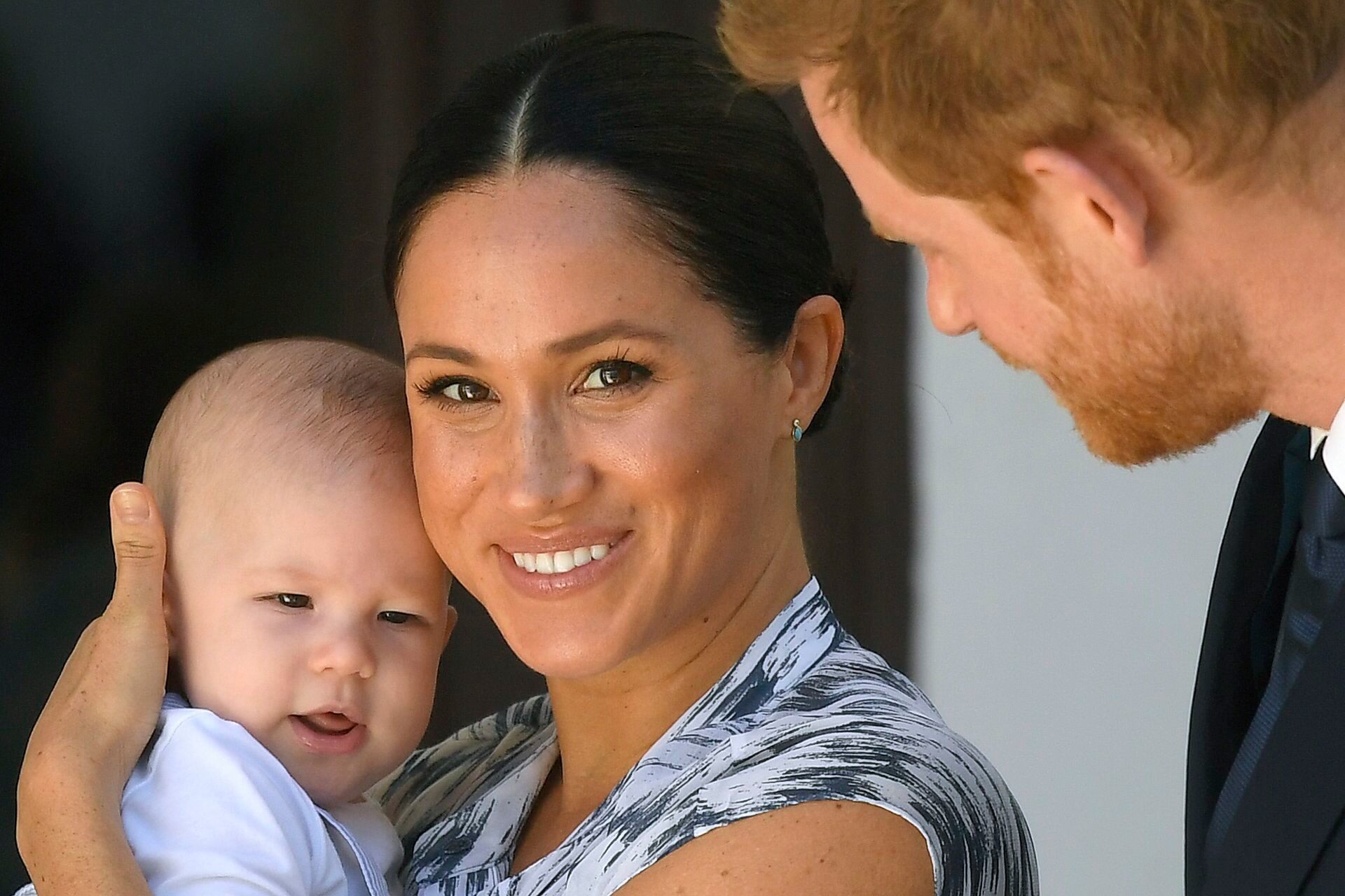 Prince Harry and Meghan Duchess of Sussex, holding their son Archie Harrison Mountbatten-Windsor
