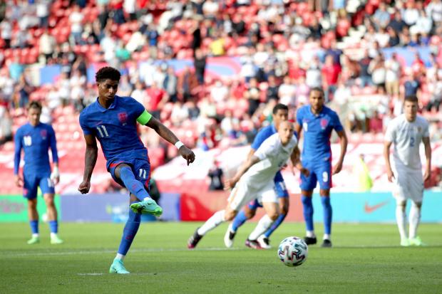 Marcus Rashford strokes home England's winning goal from the spot at Middlesbrough's Riverside Stadium Pictures: PA
