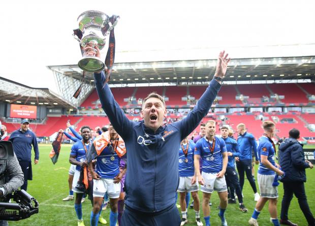 The Northern Echo: Former Hartlepool United manager Dave Challinor lifts the National League Trophy.