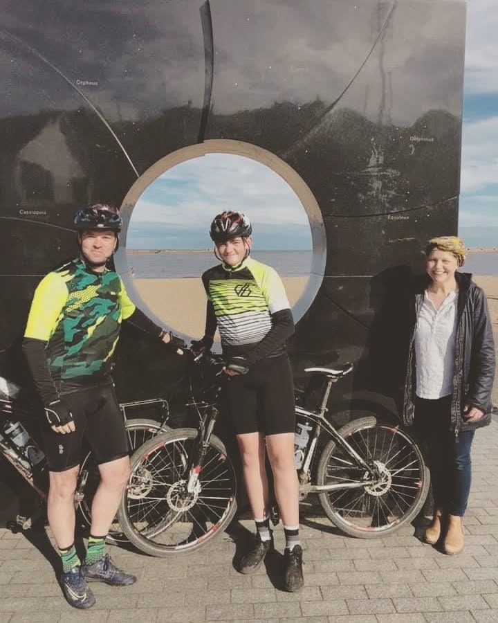 Samuel Reid with dad John on the coast to coast bike ride