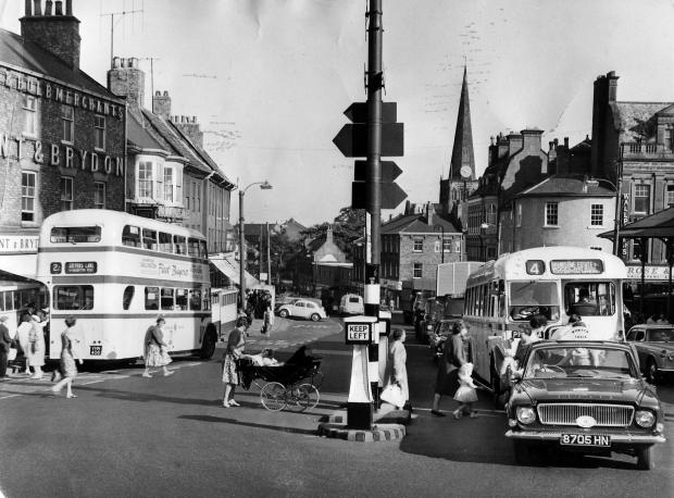 The Northern Echo: A busy street scene in Tubwell Row in September 1963. That lady is pushing a pram that must have come from Thornleys in Northgate
