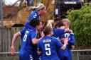 Durham Women's players celebrate a goal - the club are currently top of the Women's Championship table