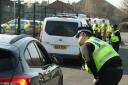 Police check vehicles in Catterick Garrison Picture: PHILIP SEDGWICK