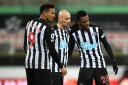 Newcastle United's Joe Willock, right, with Joelinton and Jonjo Shelvey celebrate after the final whistle during the Premier League match at St James' Park, Newcastle, this weekend