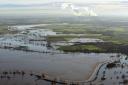 Floodwater covers land around Cawood, North Yorkshire after the River Ouse burst its banks. PRESS ASSOCIATION Photo. Picture date: Sunday December 27, 2015. The Prime Minister has promised to send more troops to "do whatever is needed" to help
