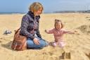 The seaside was calling for this mother and daughter building sandcastles at Sandhaven beach, South Shields Picture: NORTHE NEWS