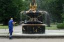 A council workman sweeps up around the fountain at Middlesbrough’s Albert Park. Picture: IAN COOPER/TEESSIDE LIVE