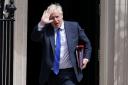 Boris Johnson waved for the cameras as he left Number 10 for Prime Ministers Questions on Wednesday (July 6). Picture: PA