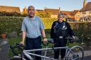 Blind cyclist Nadeem Mughal, 52, with his specially adapted bike after he was reunited with it by PCSO Nic Clerc.