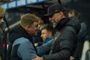 Newcastle United head coach Eddie Howe and Liverpool boss Jurgen Klopp