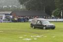 The friendly between Dunston UTS and Gateshead was abandoned after the half-time pitch incursion of a hearse and Subaru car driven by masked men