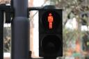 A motorist who failed to stop for a red light at a pelican crossing while driving with no insurance has been ordered to pay more than £1,000 in fines and costs.