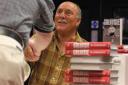 Jimmy Greaves signs his book in the MetroCentre in October 2003