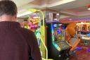 Ben in an amusement arcade in Seaton Carew, where his gambling addiction began