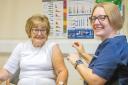 Nancy Spencer gets her flu jab from Nadia Carter, Practice Lead Nurse at Denmark Street Surgery
