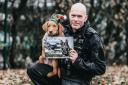 Police dog handler PC Ian Squire pictured with puppy Kitch