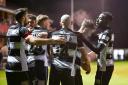 Darlington's players celebrate their goal during their midweek draw with Warrington