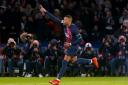 Kylian Mbappe celebrates scoring his controversial stoppage time equaliser against Newcastle