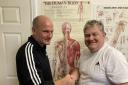 Nigel Carnell, of Hurworth Physiotherapy, with Steve Collins. Steve is retiring after more than 30 years