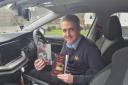 Keith with his new book - The Seekers of Duat - in his taxi