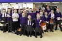Pupils from Moorside Primary School treated shoppers to a Christmas carol medley