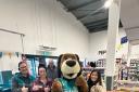 Layla Dudding and Aimee Hay with Poundland staff on a visit to Poundland in Arnison Retail Park in Durham