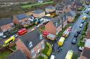 Aerial view of police search at the defendant's home in Ingleby Barwick, last month