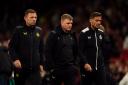 Newcastle United boss Eddie Howe flanked by coaching staff Jason Tindall and Graeme Jones