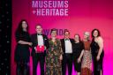 From left, host Ella Al-Shamahi, the museum's enterprise manager David Nicholls, executive director Hannah Fox, chair of trustees Peter Mothersill, cafe supervisor Lisa Waller, collections manager Jane Whittaker, and director of programmes Vicky Sturrs