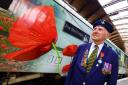 Ken Cooke boarding the 'For the fallen' LNER train to London