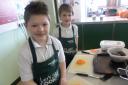 Oliver Dixon and Kierin Thompson from Laurel Avenue Community Primary School make a Big Cookathon cottage pie