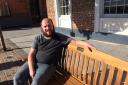 Richard Lee on the new bench in Dovecote Street