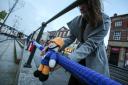 Julie Nisbet puts out a knitted ‘thin blue line’ to honour police and fire workers on High Row, Darlington. Picture: TOM BANKS