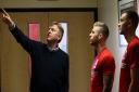 RESPECT: Dave Parnaby, left, talks with Adam Clayton, center, and Ben Gibson. Picture: Courtesy of Middlesbrough FC