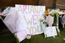 GRIEF: Flowers left at the scene of the Ariana Grande concert, in Manchester, where a bomber blew himself up. Picture: PA