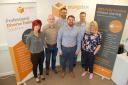 GROWTH: Simon Corbett, centre, with Nicola Worrall, sales manager; Tony Green, operations manager; Glen Hughes, design and marketing manager; Kevin Redhouse, learning and development consultant; and Rebecca Miller-Innes, training manager