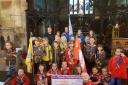 GRANT: Cllr Richard Manchester with 1st Tow Law Guides, Brownies and Rainbows with the new flags