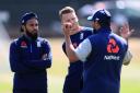 England's Adil Rashid (left) and Jos Buttler speak with spin bowling consultant Saqlain Mushtaq during a nets session at Edgbaston, Birmingham. Picture: PA