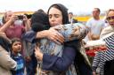 WELLINGTON, NEW ZEALAND - MARCH 17: Prime Minister Jacinda Ardern hugs a mosque-goer at the Kilbirnie Mosque on March 17, 2019 in Wellington, New Zealand. 50 people are confirmed dead and 36 are injured still in hospital following shooting attacks on two