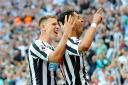 Matt Ritchie and Ayoze Perez celebrate a Newcastle United goal