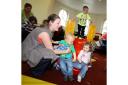 PHOENIX RISES: The parent and toddler group in their new home.